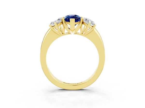 Yellow gold Marquise Cut Blue Sapphire Three-Stone Ring with Four-Prong Setting and Classic Band