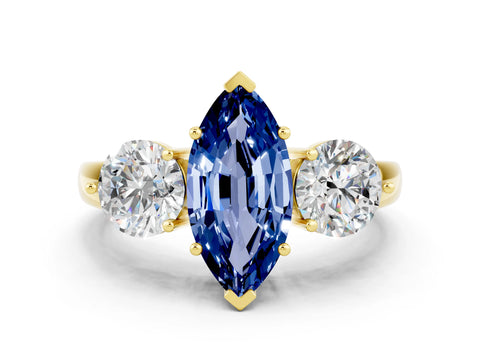 Yellow gold Marquise Cut Blue Sapphire Three-Stone Ring with Prong Setting and Classic Band