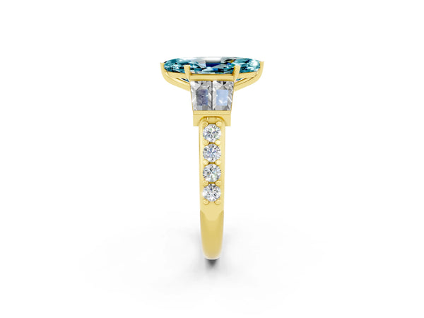 Yellow gold Marquise Cut Blue Topaz Engagement Ring with Baguette Side Stones and Channel Set Band