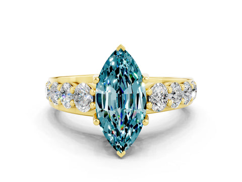 Yellow gold Marquise Cut Blue Topaz Engagement Ring with Pavé Band and Four-Prong Setting