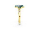 Yellow gold Marquise Cut Blue Topaz Engagement Ring with Side Stone Accents and Four-Prong Setting_62