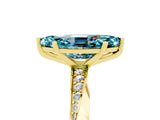 Yellow gold Marquise Cut Blue Topaz Engagement Ring with Side Stone Accents and Four-Prong Setting_65