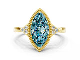 Yellow gold Marquise Cut Blue Topaz Halo Ring with Tapered Band and Four-Prong Setting