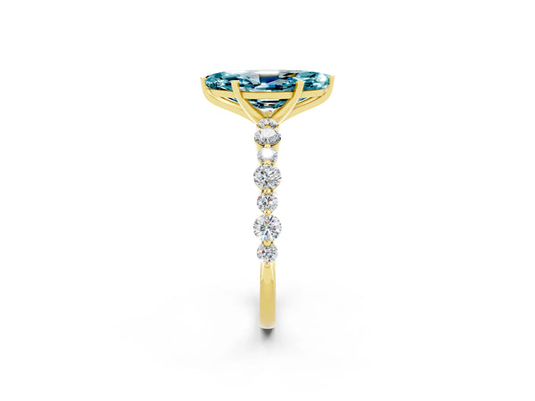 Yellow gold Marquise Cut Blue Topaz Prong Set Engagement Ring with Pavé Band
