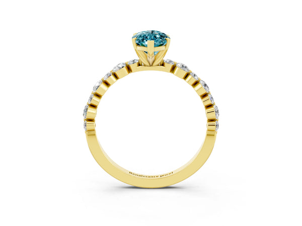 Yellow gold Marquise Cut Blue Topaz Prong Set Engagement Ring with Pavé Band
