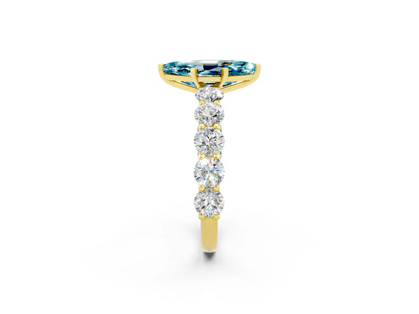 Yellow gold Marquise Cut Blue Topaz Prong Setting with Side Stones on a Pave Band