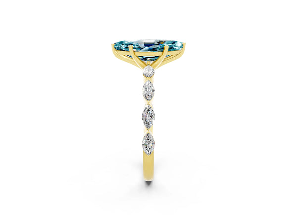 Yellow gold Marquise Cut Blue Topaz Ring with Marquise Side Stones and Prong Setting