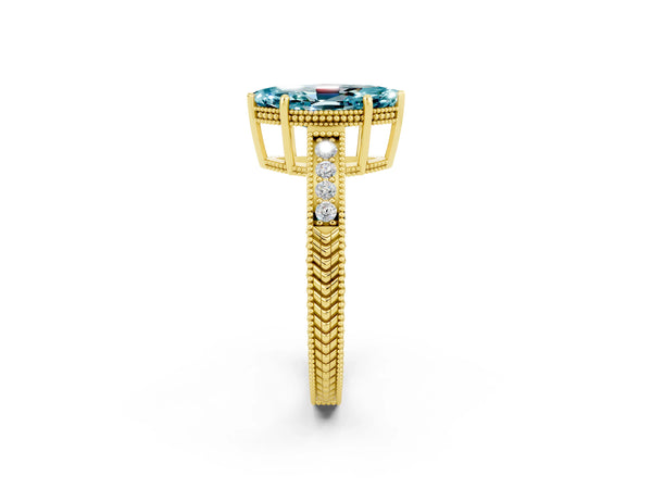 Yellow gold Marquise Cut Blue Topaz Ring with Milgrain Pavé Band and Four-Prong Setting