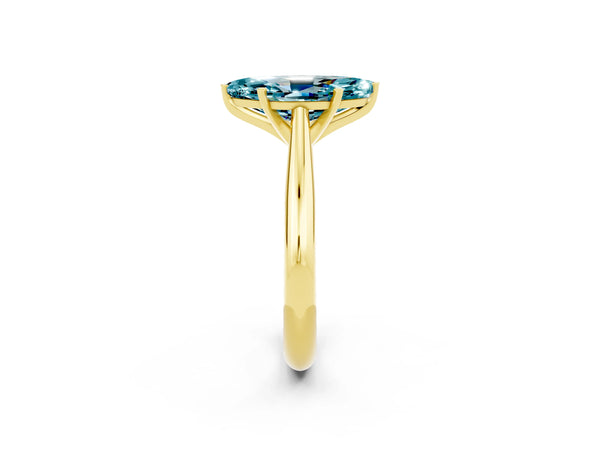Yellow gold Marquise Cut Blue Topaz Solitaire Engagement Ring with Cathedral Setting and Four-Prong Mount