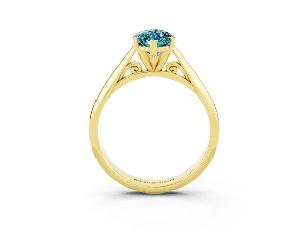Yellow gold Marquise Cut Blue Topaz Solitaire Engagement Ring with Cathedral Setting and Four-Prong Mount