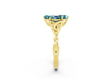 Yellow gold Marquise Cut Blue Topaz Solitaire Engagement Ring with Celtic Knot Band and Four-Prong Setting_2