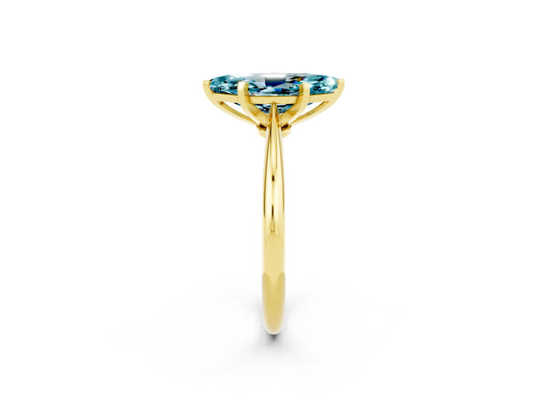 Yellow gold Marquise Cut Blue Topaz Solitaire Engagement Ring with Classic Band and Four-Prong Setting
