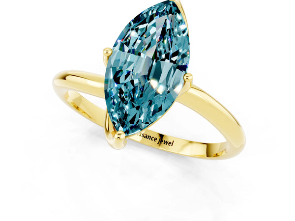 Yellow gold Marquise Cut Blue Topaz Solitaire Engagement Ring with Four-Prong Setting and Classic Band