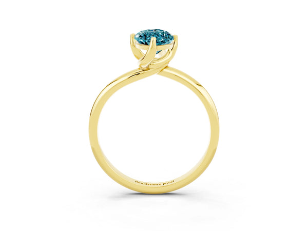 Yellow gold Marquise Cut Blue Topaz Solitaire Engagement Ring with Four-Prong Setting and Classic Band