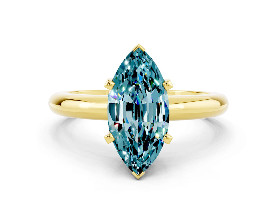 Yellow gold Marquise Cut Blue Topaz Solitaire Engagement Ring with Round Band and Four-Prong Setting
