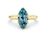 Yellow gold Marquise Cut Blue Topaz Solitaire Engagement Ring with Round Band and Four-Prong Setting