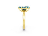 Yellow gold Marquise Cut Blue Topaz Solitaire Engagement Ring with Round Band and Four-Prong Setting_2