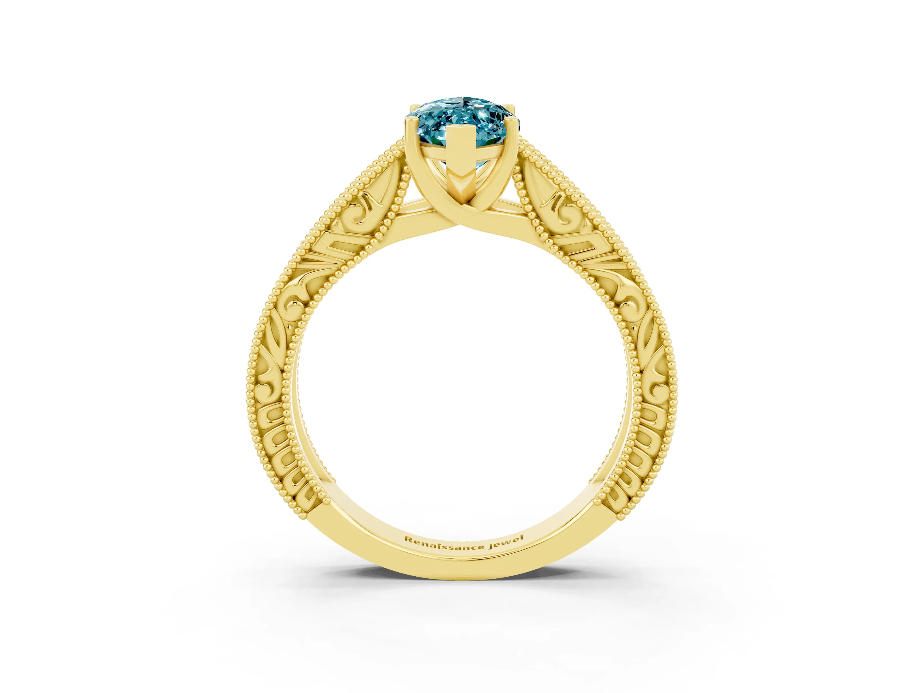 Yellow gold Marquise Cut Blue Topaz Solitaire Ring with Engraved Band and Four-Prong Setting_3
