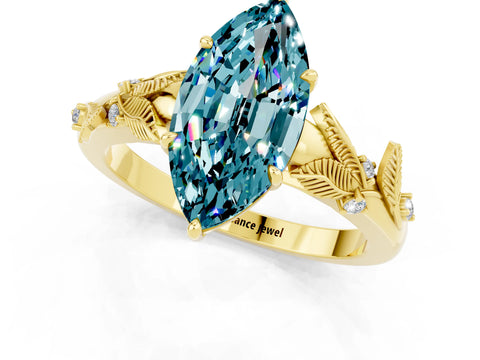 Yellow gold Marquise Cut Blue Topaz Solitaire Ring with Leaf Motif Band and Four-Prong Setting_1
