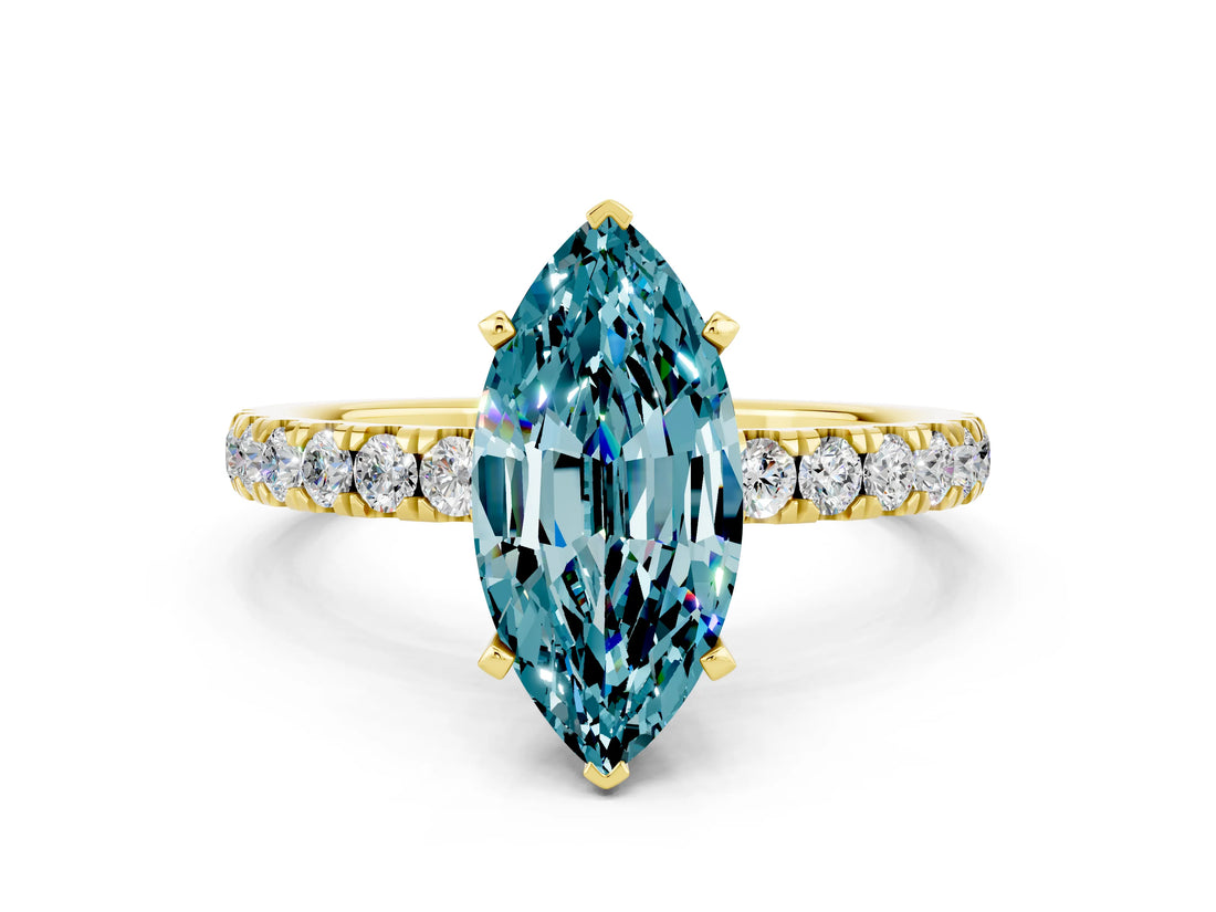 Yellow gold Marquise Cut Blue Topaz Solitaire Ring with Pavé Accents and Four-Prong Setting