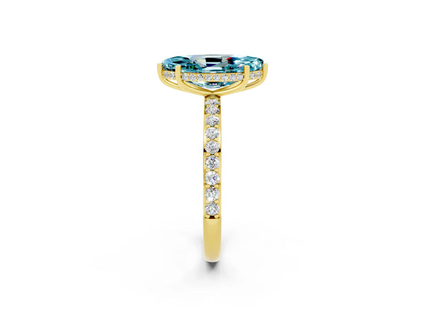 Yellow gold Marquise Cut Blue Topaz Solitaire Ring with Pavé Band and Hidden Halo