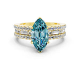 Yellow gold Marquise Cut Blue Topaz Solitaire Ring with Pavé and Channel Set Band