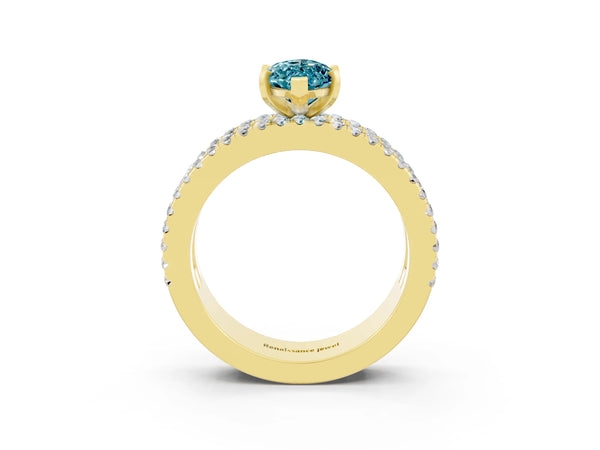 Yellow gold Marquise Cut Blue Topaz Solitaire Ring with Pavé and Channel Set Band