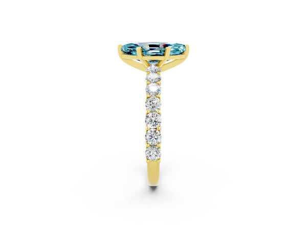 Yellow gold Marquise Cut Blue Topaz Solitaire Ring with Shared Prong Pavé Band and Four-Prong Setting