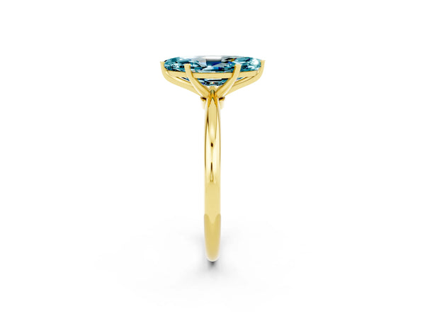 Yellow gold Marquise Cut Blue Topaz Solitaire Ring with Six-Prong Setting and Classic Band
