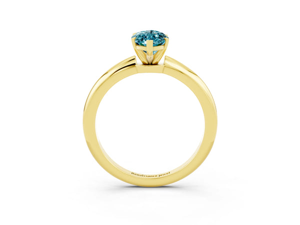 Yellow gold Marquise Cut Blue Topaz Solitaire Ring with Six-Prong Setting and Classic Band