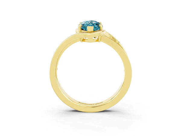 Yellow gold Marquise Cut Blue Topaz Solitaire Ring with Split Shank and Prong Setting