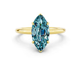 Yellow gold Marquise Cut Blue Topaz Solitaire Ring with Thin Band and Four-Prong Setting