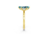 Yellow gold Marquise Cut Blue Topaz Solitaire Ring with Thin Band and Four-Prong Setting_2
