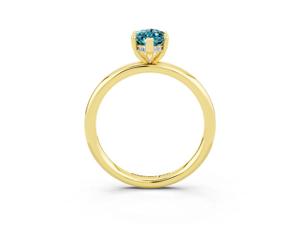 Yellow gold Marquise Cut Blue Topaz Solitaire Ring with Thin Band and Four-Prong Setting