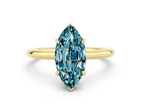 Yellow gold Marquise Cut Blue Topaz Solitaire Ring with Thin Band and Four-Prong Setting