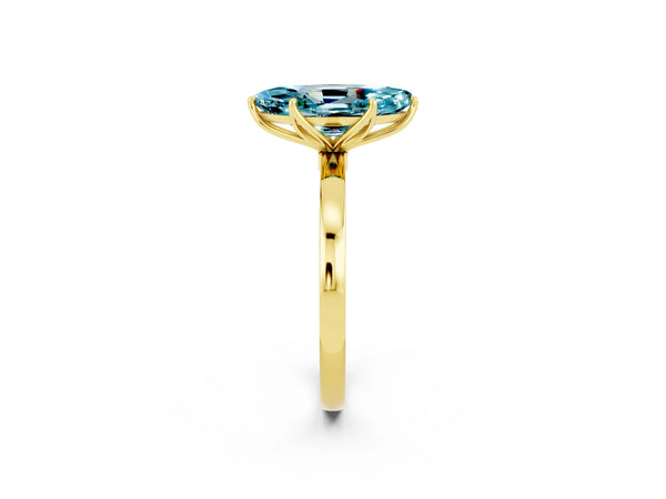 Yellow gold Marquise Cut Blue Topaz Solitaire Ring with Thin Band and Prong Setting