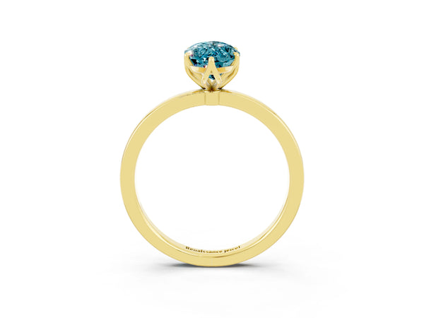Yellow gold Marquise Cut Blue Topaz Solitaire Ring with Thin Band and Prong Setting