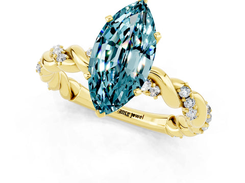 Yellow gold Marquise Cut Blue Topaz Solitaire Ring with Twisted Band and Pavé Accents_1