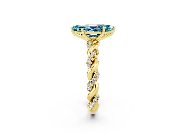 Yellow gold Marquise Cut Blue Topaz Solitaire Ring with Twisted Band and Pavé Accents