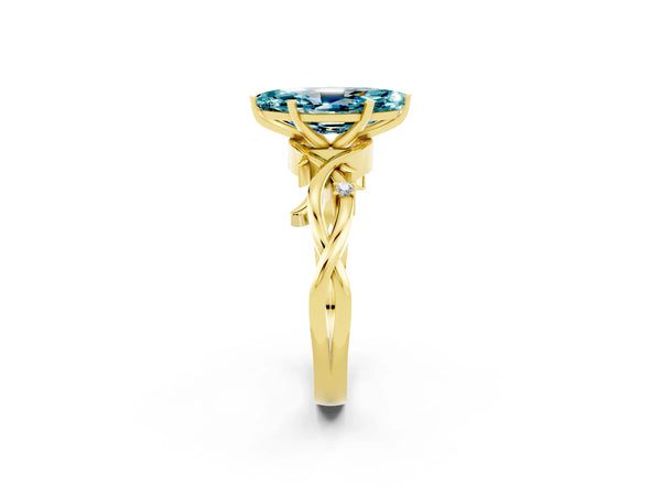 Yellow gold Marquise Cut Blue Topaz Solitaire Ring with Twisted Band and Prong Setting