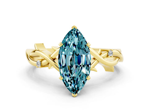 Yellow gold Marquise Cut Blue Topaz Solitaire Ring with Twisted Band and Prong Setting