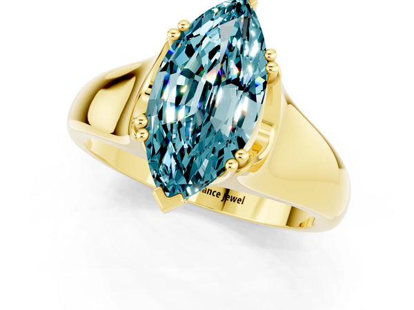 Yellow gold Marquise Cut Blue Topaz Solitaire Ring with Wide Band and Prong Setting