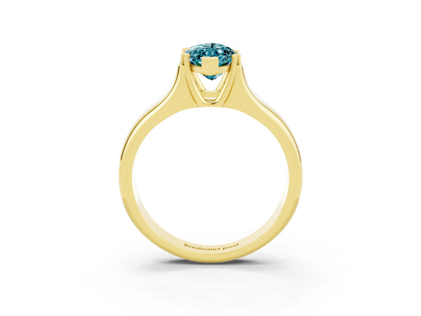 Yellow gold Marquise Cut Blue Topaz Solitaire Ring with Wide Band and Prong Setting
