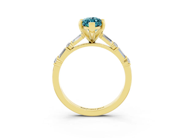 Yellow gold Marquise Cut Blue Topaz Solitaire with Side Baguettes and Channel Set Band