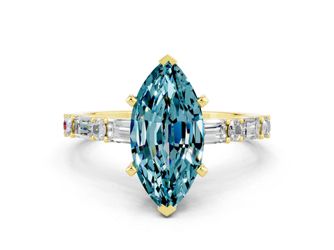 Yellow gold Marquise Cut Blue Topaz Solitaire with Side Baguettes and Channel Set Band