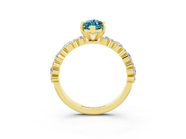 Yellow gold Marquise Cut Blue Topaz Side Stone Solitaire Ring with Round  and Four-Prong Setting