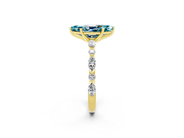 Yellow gold Marquise Cut Blue Topaz Ring with Marquise and Round  Side Stones and Four-Prong Setting