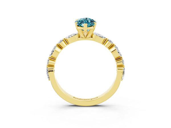 Yellow gold Marquise Cut Blue Topaz Ring with Marquise and Round  Side Stones and Four-Prong Setting