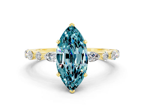 Yellow gold Marquise Cut Blue Topaz Solitaire with Side Stones on a Pavé Band and Four-Prong Setting