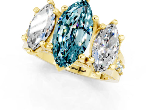 Yellow gold Marquise Cut Blue Topaz Three-Stone Ring with Channel Set Band and Four-Prong Setting_1